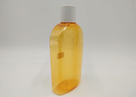 Pusta butelka szamponu w kolorze pomarańczowym, butelka do pakowania kosmetycznego o pojemności 30 ml