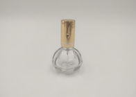 Okrągła szklana butelka perfum ze złotą pompką z niestandardowym nadrukiem logo